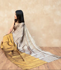 Handwoven Chanderi silk saree in gold and copper Pure Tissue Dual tone Saree  by Rewaayat